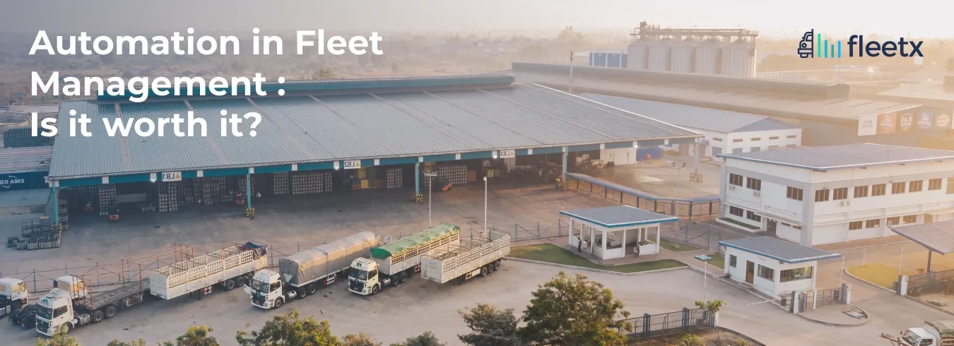 Distribution center with commercial trucks illustrating automation in fleet management and warehouse logistics operations.